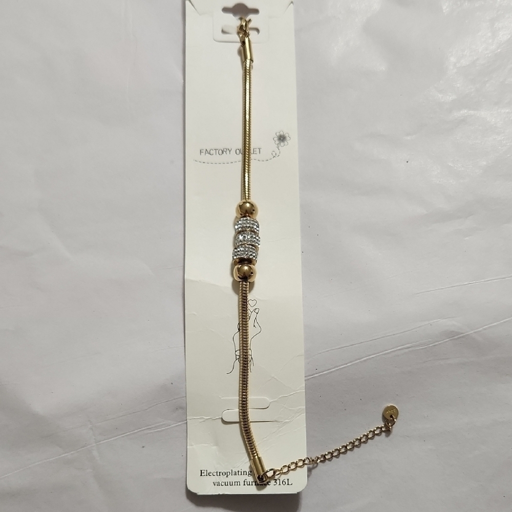Elegant Gold Bracelet with Silver Accents - Picture 3 of 4